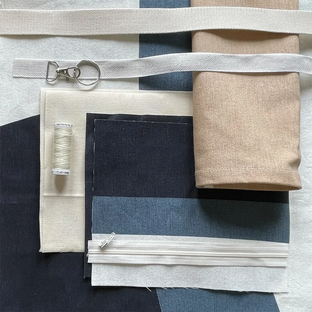 Materialien der Hut-Tasche blau-hellbraun